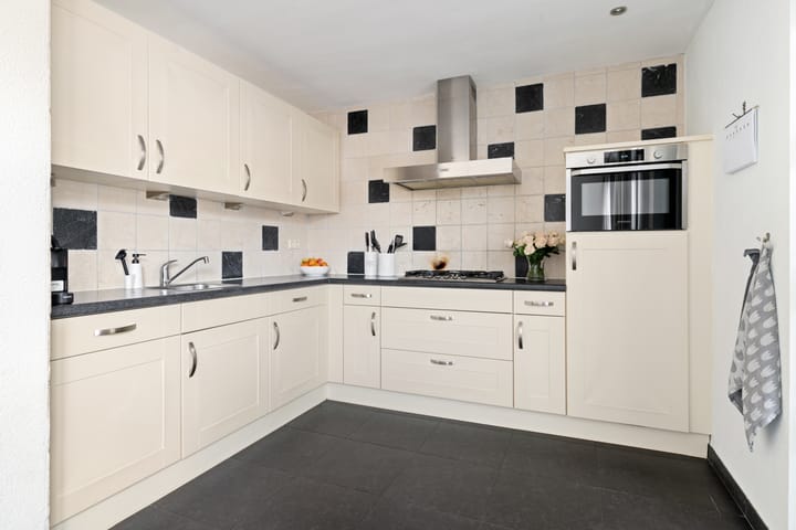 Foto 15 van Topaard 14