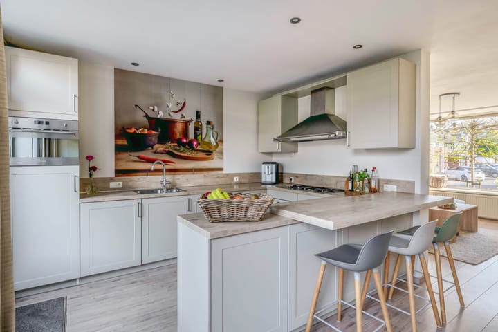 Foto 17 van Weegbree 10