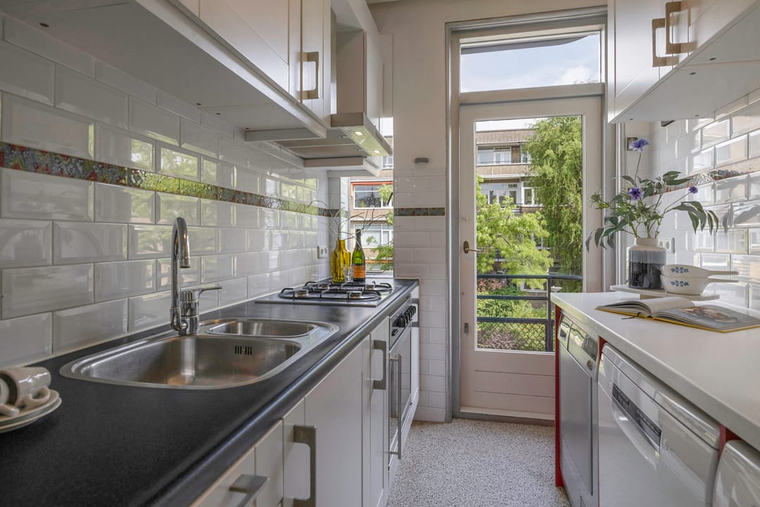 Foto 17 van Van Beuningenstraat 11-01R