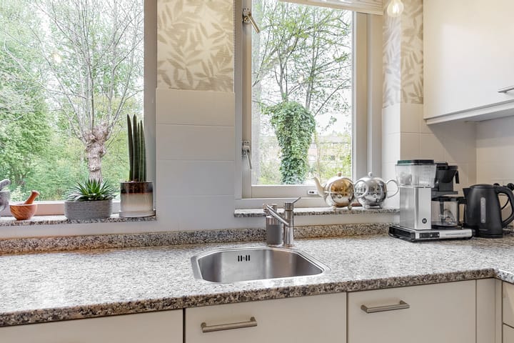 Foto 31 van Weegbree 72