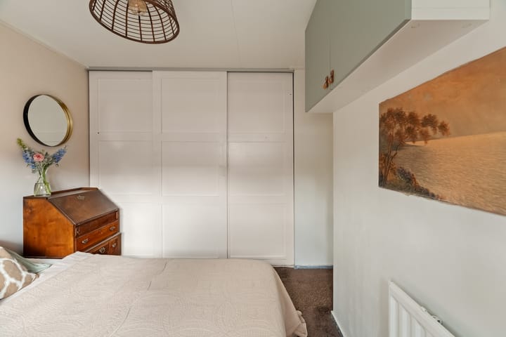 Foto 17 van Woudstraat 54