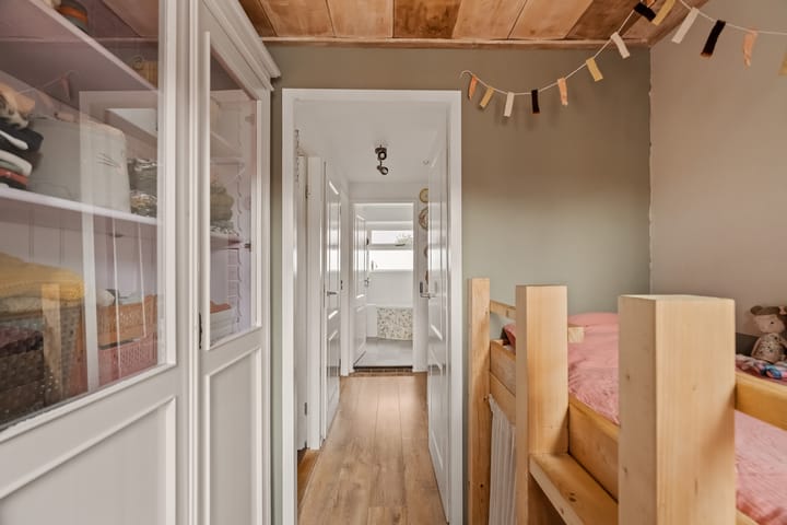 Foto 22 van Woudstraat 54