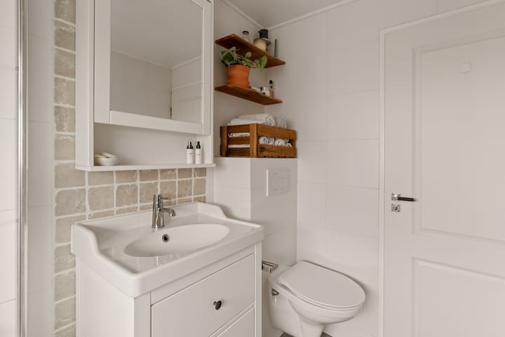 Foto 25 van Woudstraat 54