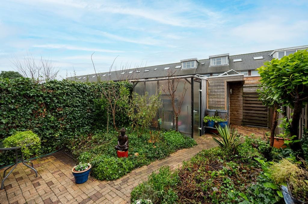 Foto 24 van A. Roland Holststraat 30