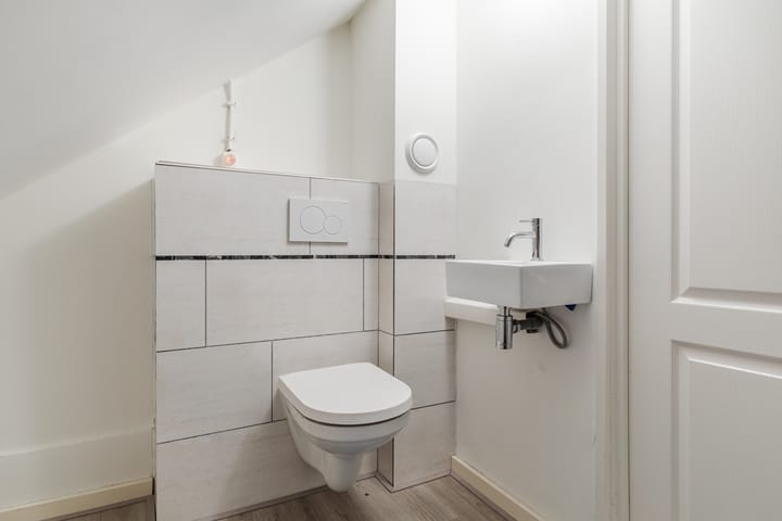 Foto 32 van Houtstraat 75