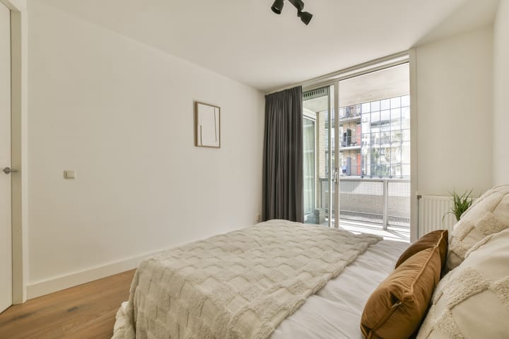 Foto 12 van Jodenbreestraat 16-B