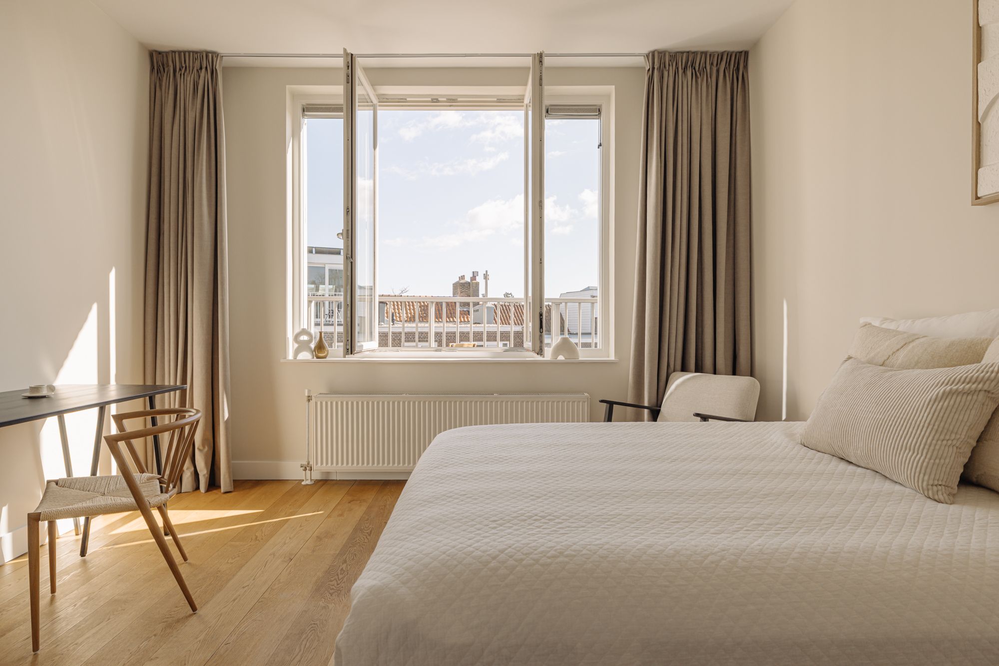 Foto 12 van Hogeweg 132-3