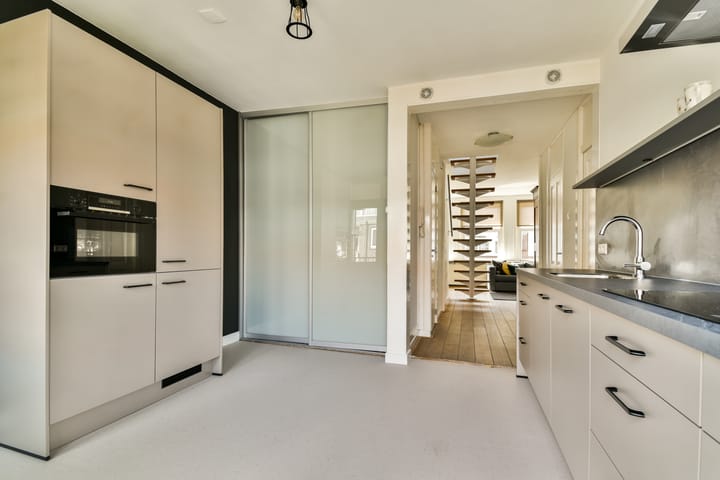 Foto 8 van Woubruggestraat 15-2