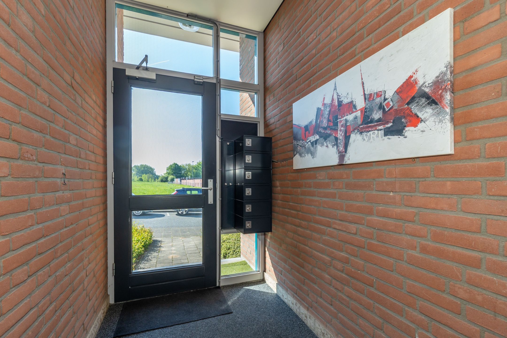 Foto 12 van Demstraat 10-C