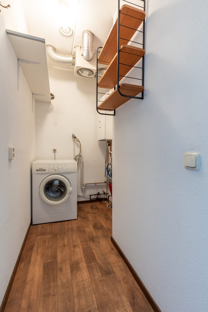 Foto 26 van Raadhuisstraat 115