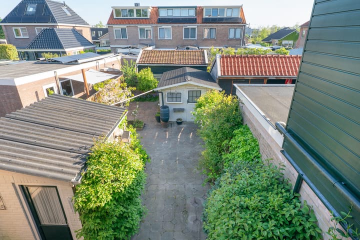 Foto 31 van Poststraat 13