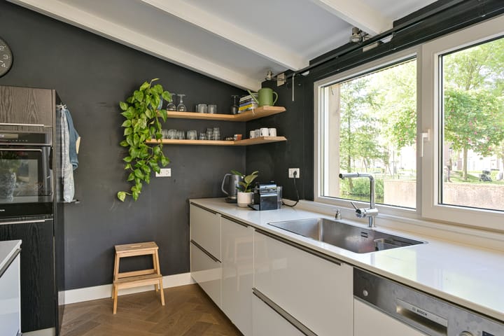 Foto 11 van Crooswijksebocht 72