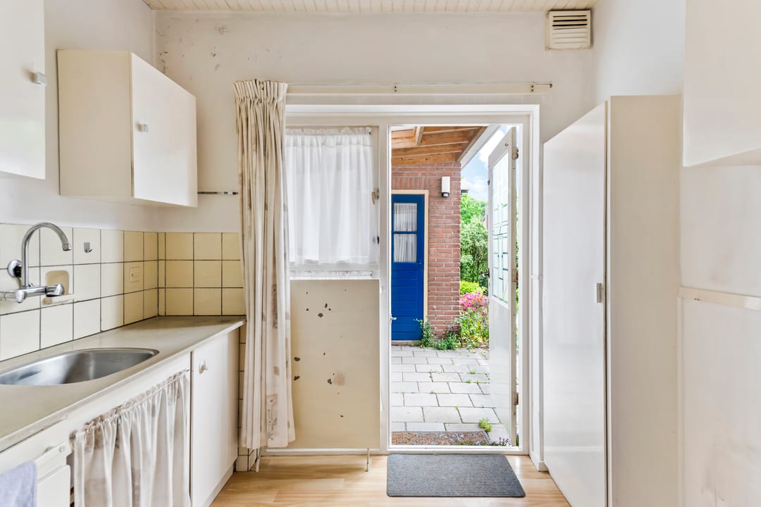 Foto 13 van Vossenstraat 12