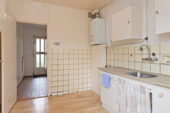 Foto 14 van Vossenstraat 12