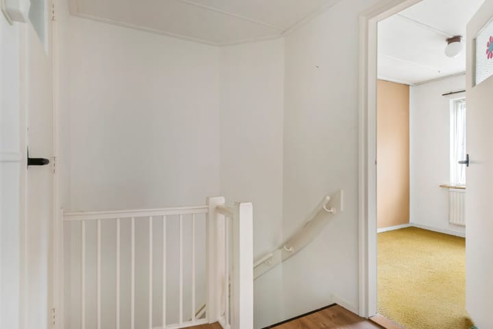 Foto 25 van Vossenstraat 12