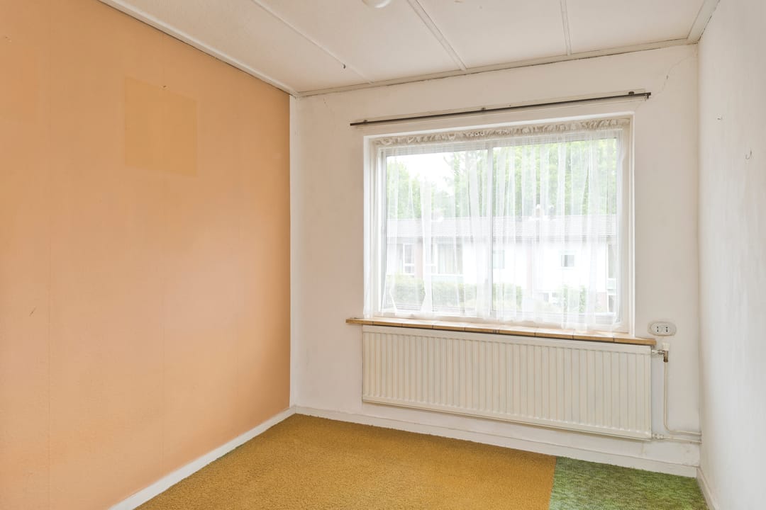 Foto 26 van Vossenstraat 12