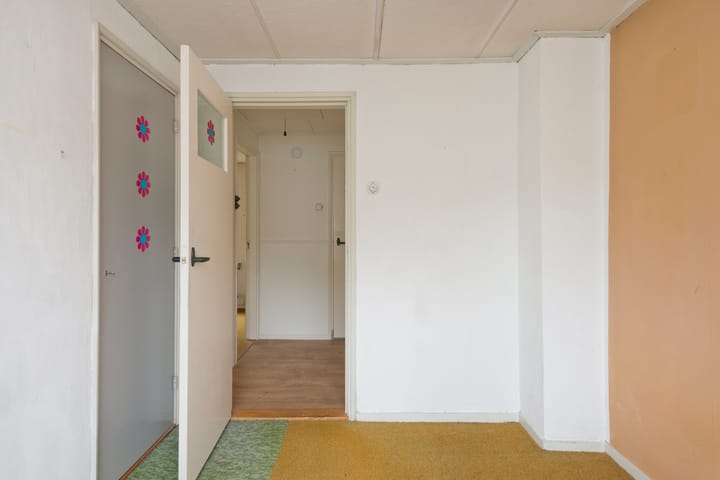 Foto 27 van Vossenstraat 12