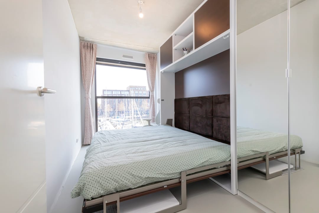 Foto 23 van Krijn Taconiskade 217