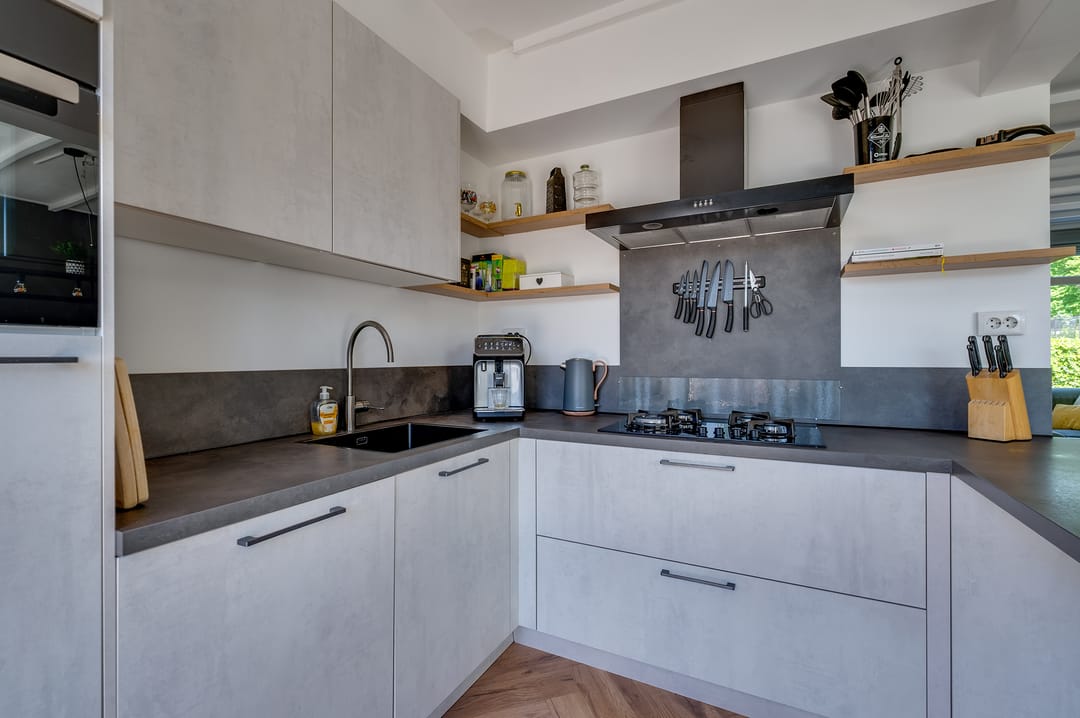 Foto 11 van Warmoeziershof 26