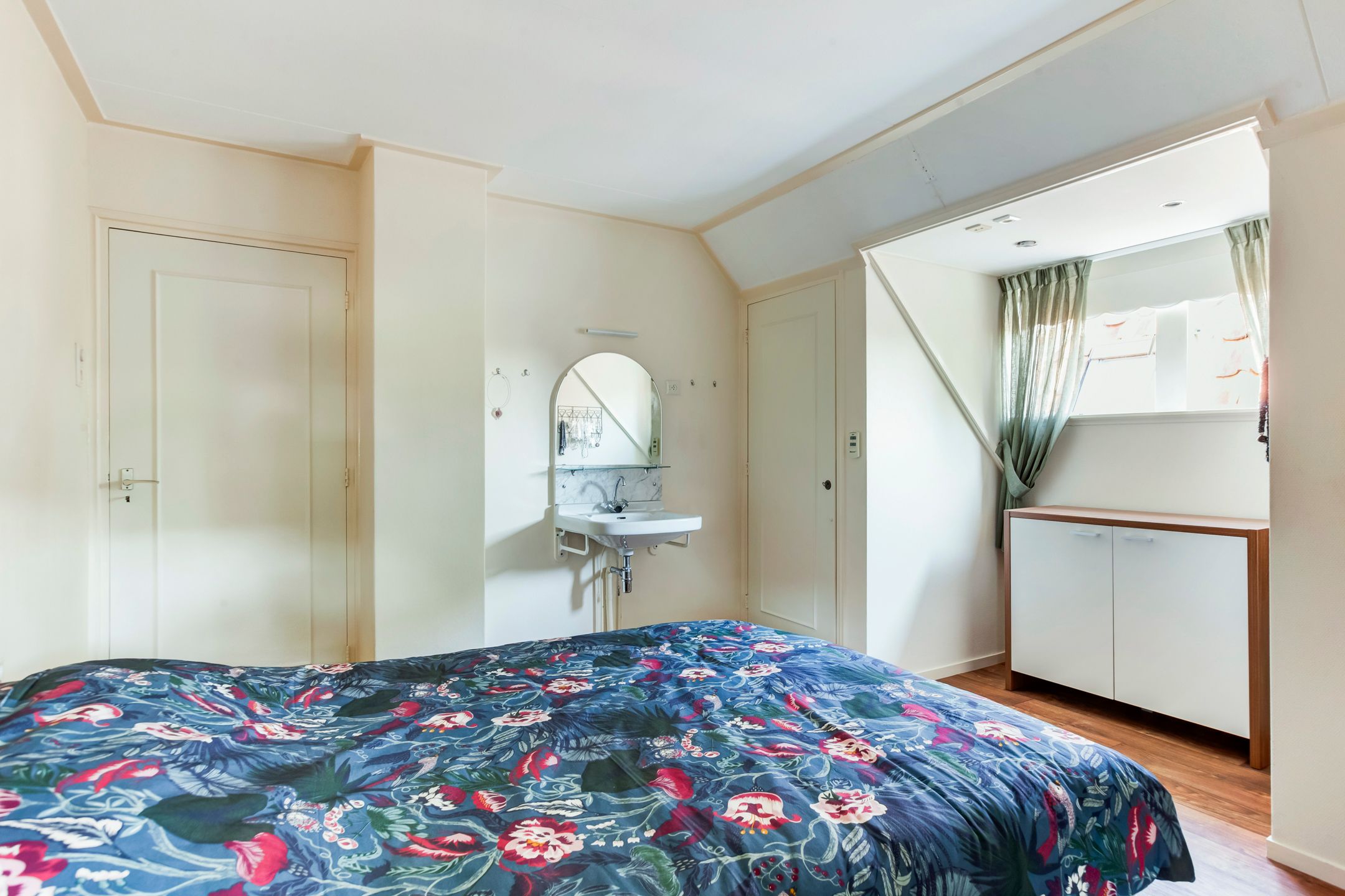 Foto 24 van Raadhuisstraat 10