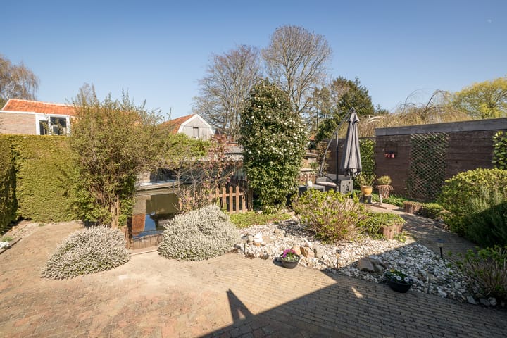 Foto 29 van Middenweg 123