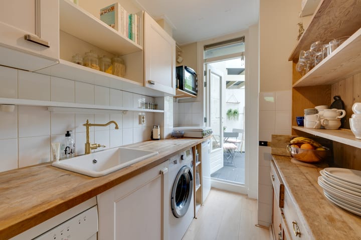 Foto 23 van Van Limburg Stirumplein 24-2