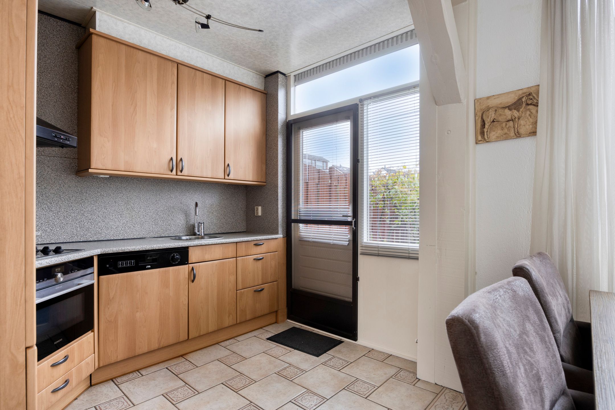 Foto 9 van Warmoeziershof 52