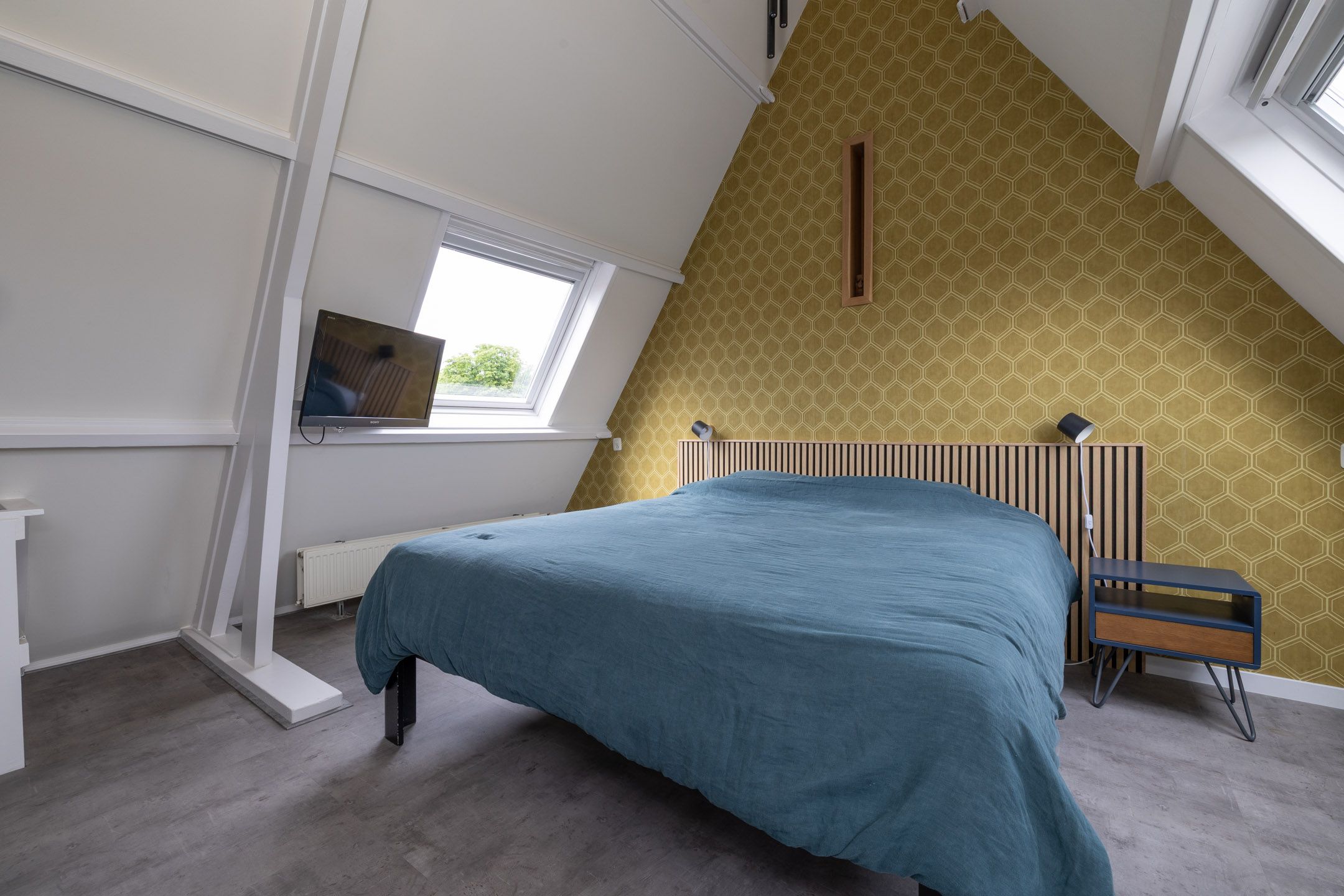 Foto 30 van Van de Sande Bakhuyzenstraat 110