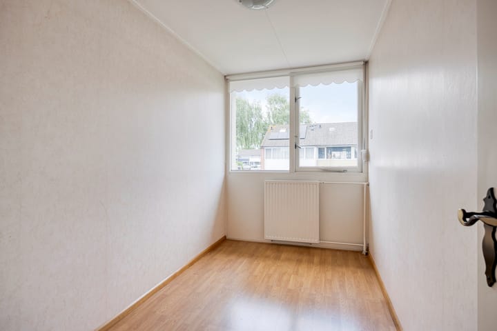 Foto 15 van Voeghoutenstraat 54