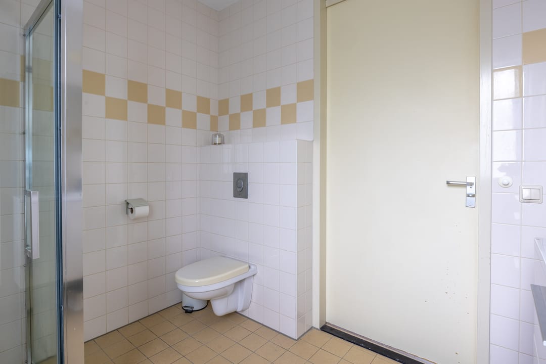 Foto 31 van Van Coeverdenstraat 9