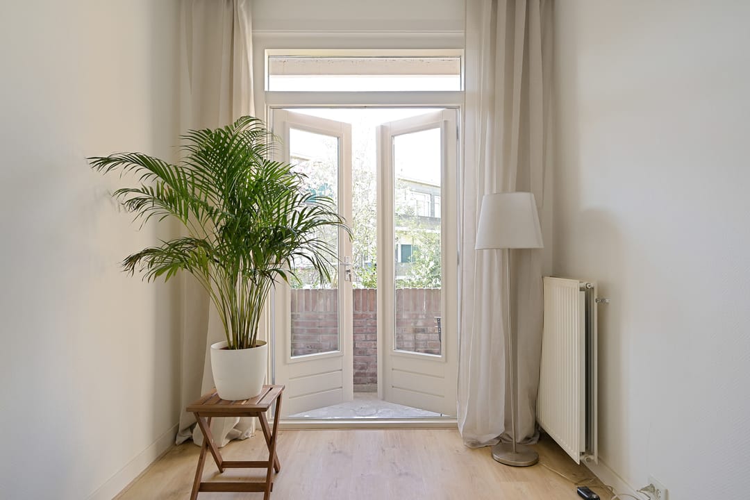 Foto 28 van Van Heutszstraat 115