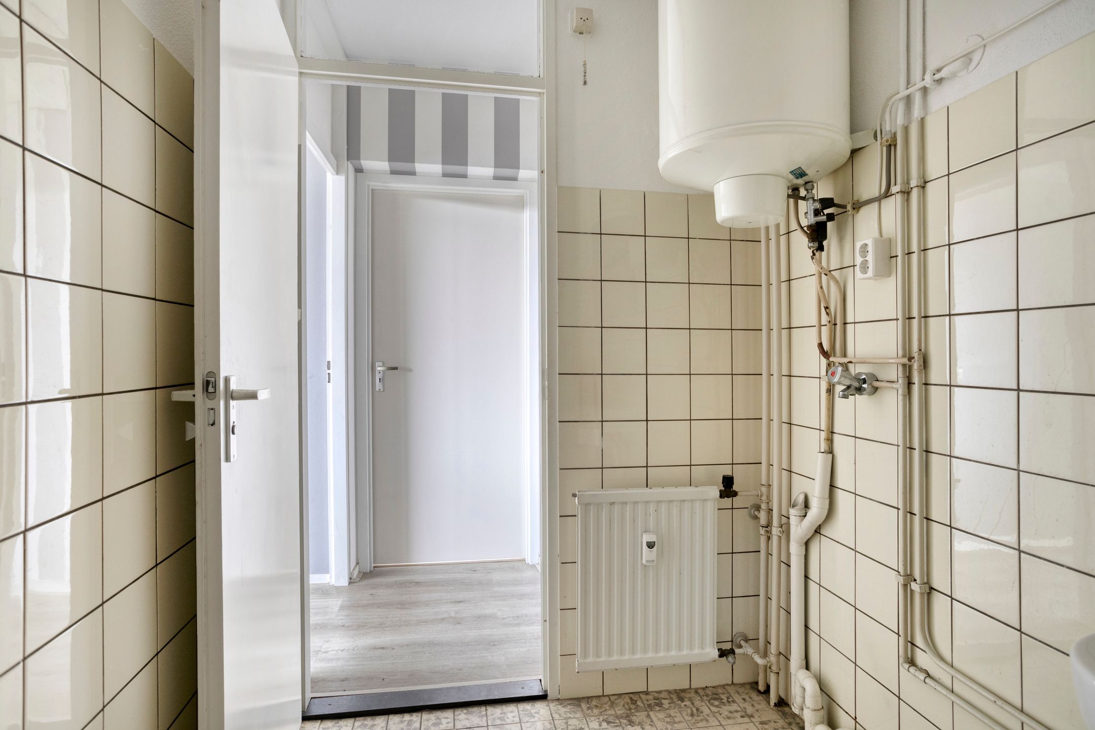 Photo 15 of Heutinkstraat 115