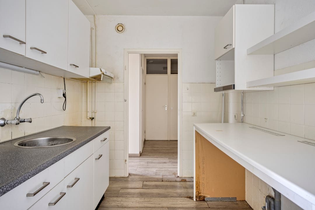 Photo 11 of Heutinkstraat 119