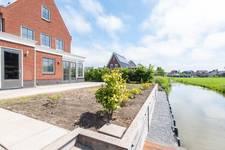 Foto 3 van Bloementuin 11