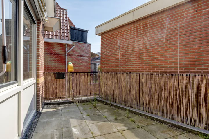 Foto 22 van Vledderstraat 10-A