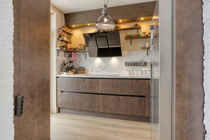 Foto 17 van Spinhuisweg 109