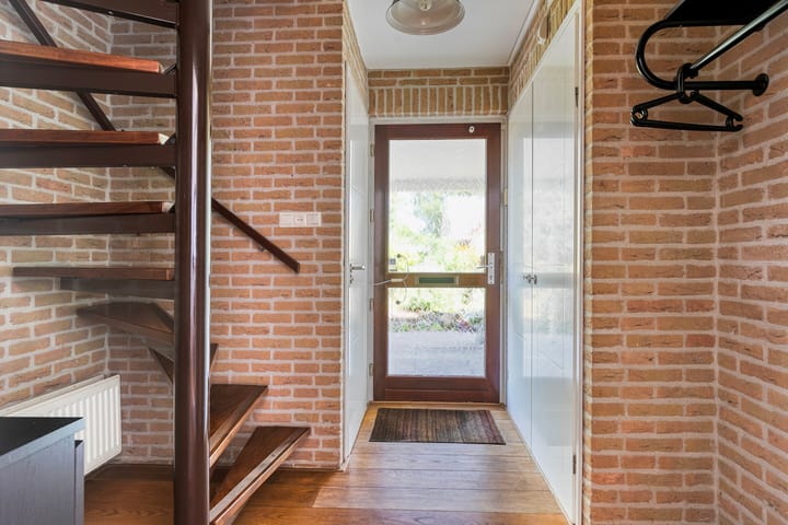 Foto 13 van Helmbloem 36