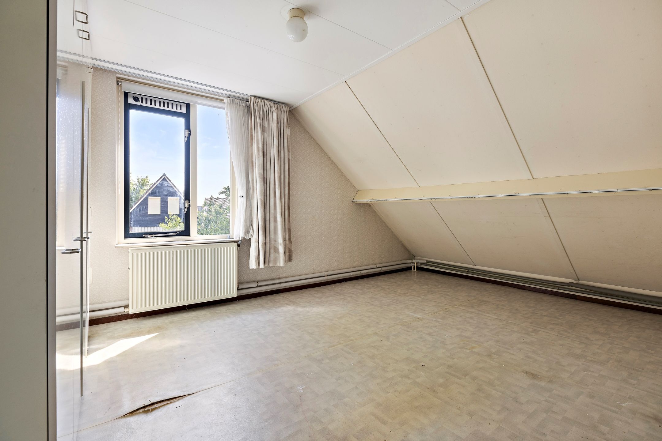 Photo 24 of Van Ewsumstraat 62