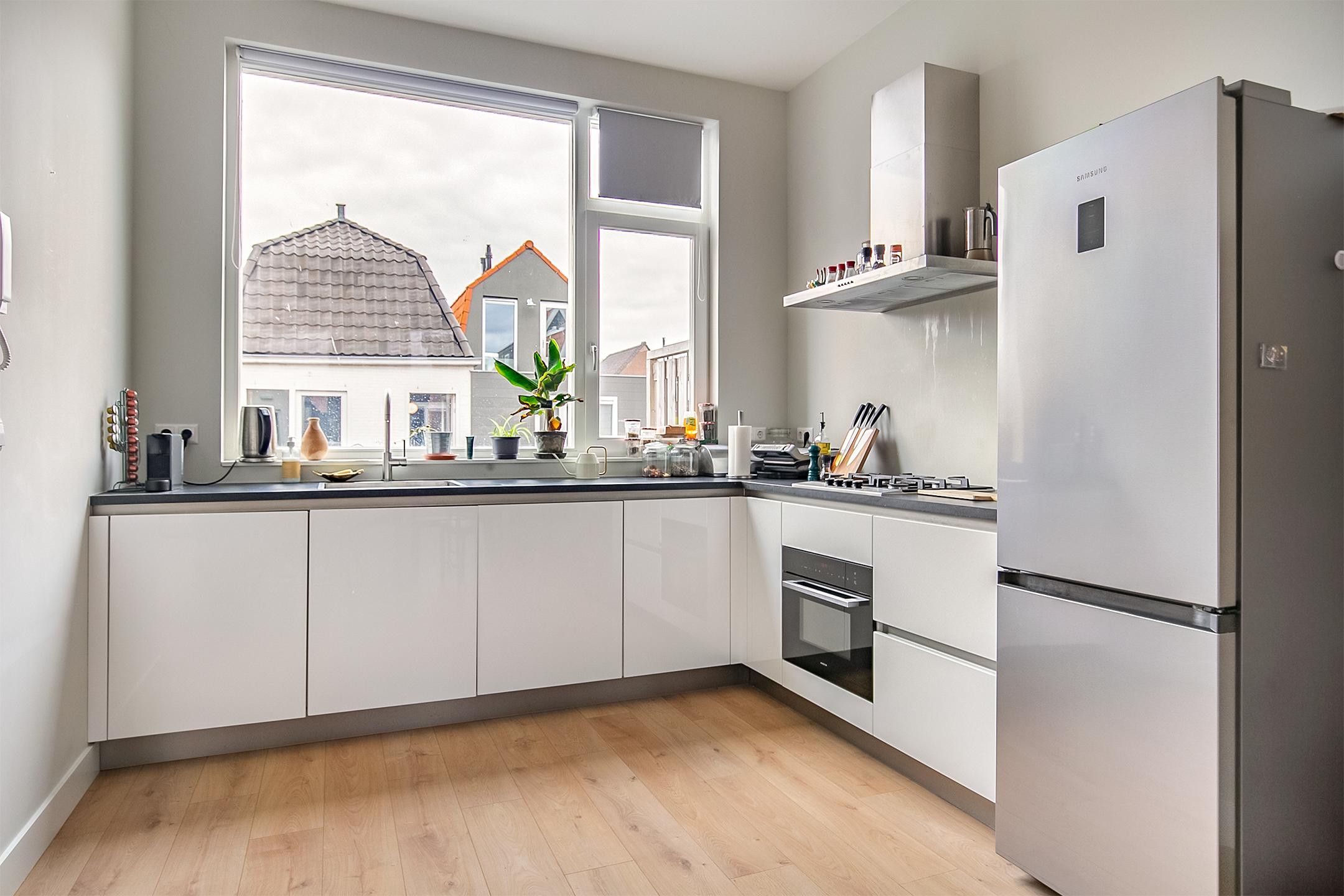 Foto 21 van Achterom 92-B