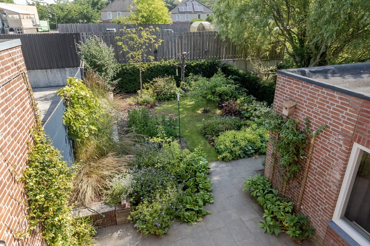 Foto 26 van Meester Delhoofenstraat 21