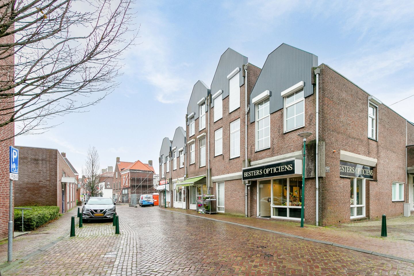 Bekijk foto 1 van Raadhuisplein 7-9