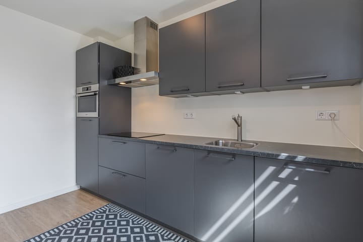 Foto 17 van Houtstraat 56-G