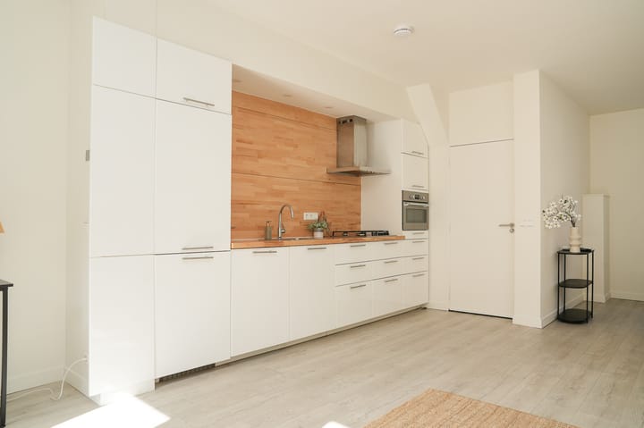 Foto 11 van Houtstraat 49