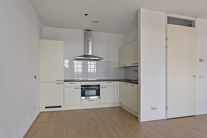 Foto 9 van Raadhuisplein 56