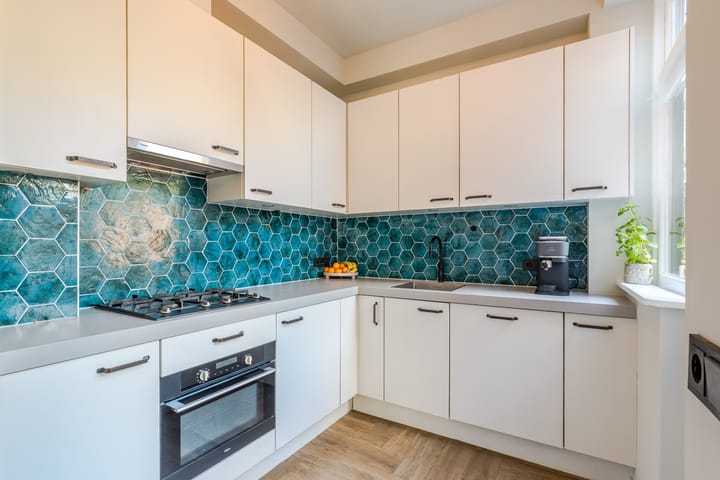 Foto 18 van E. Thomassen à Thuessinklaan 32