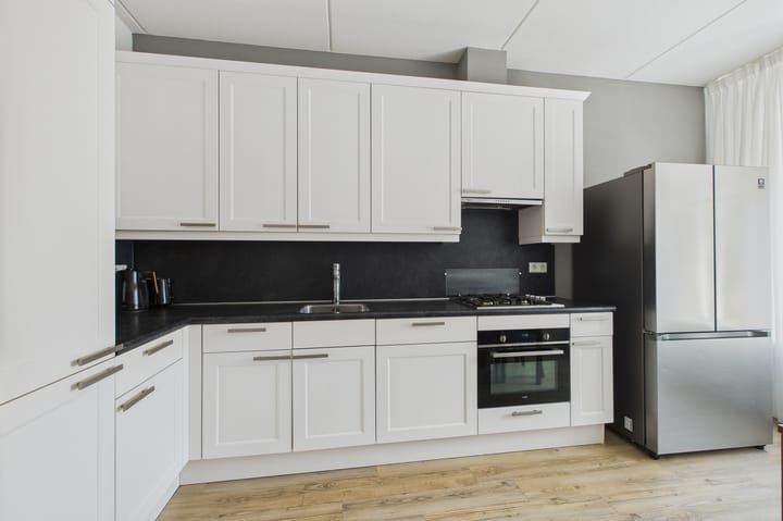 Foto 15 van Tapijtschelp 60