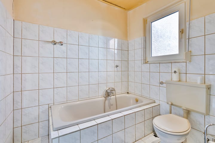 Foto 10 van Tholensstraat 147