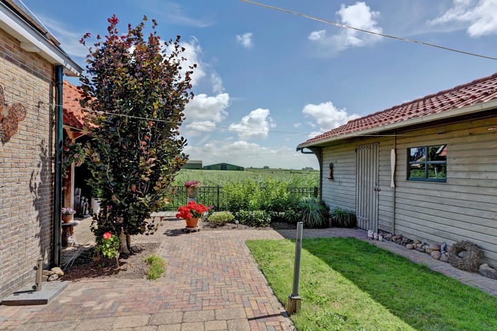 Foto 29 van Scharnebuursterweg 11