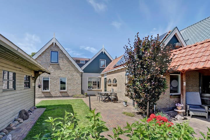 Foto 31 van Scharnebuursterweg 11