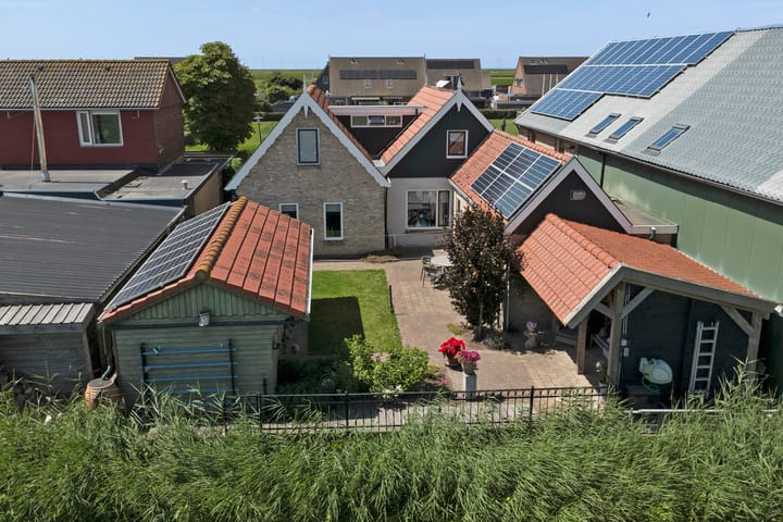 Foto 34 van Scharnebuursterweg 11